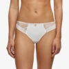 Tanga De La Marque De Lingerie Chantelle, Collection True Lace, Coloris Milk (=nacre). 2 Tanga De La Marque De Lingerie Chantelle, Collection True Lace, Coloris Milk (=nacre). -Sous Vêtement Soldes Magasin Tanga Chantelle true lace milk nacre C11M90 0LW 501